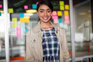 Portrait of smiling female executive