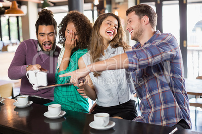 Friends enjoying at cafe