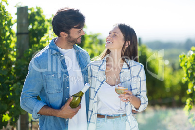 Smiling couple with wine