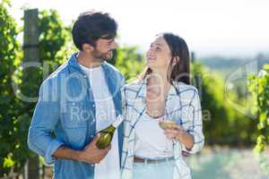 Smiling couple with wine