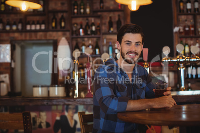 Man having beer in pub