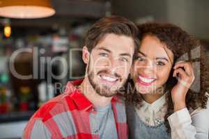 Portrait of smiling young couple