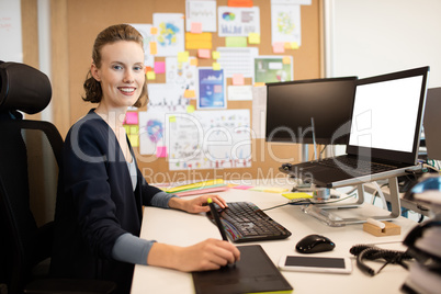 Portrait of businesswoman working at office