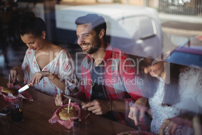 Friends having burger together