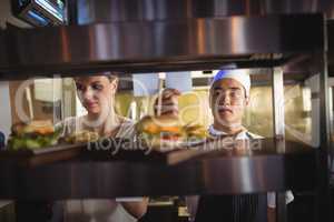 Chef looking at an order list in the commercial kitchen