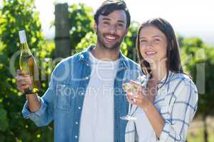 Portrait of smiling couple with wineglasses
