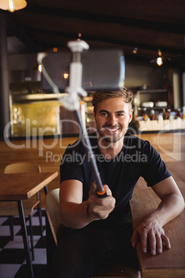 Happy man taking selfie from mobile phone