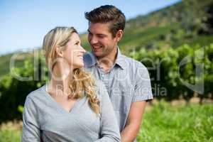 Happy young couple looking at each other