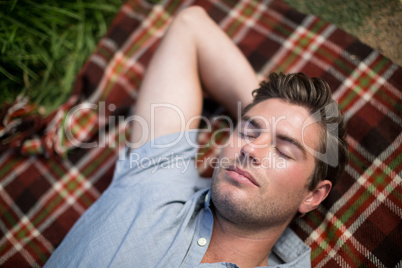 Man sleeping on blanket