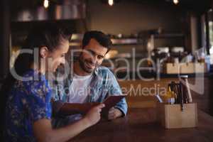 Couple looking at menu