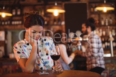 Upset woman ignoring affectionate couple