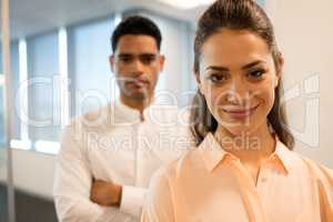 Confident business people standing in office
