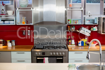 Stove and shelf in kitchen