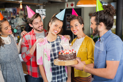 Friends celebrating woman birthday in restaurant