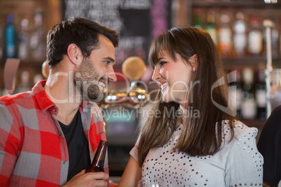 Happy young couple looking at each other
