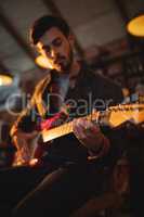 Young man playing guitar