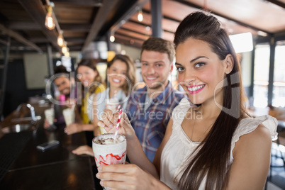 Friends having drinks in restaurant