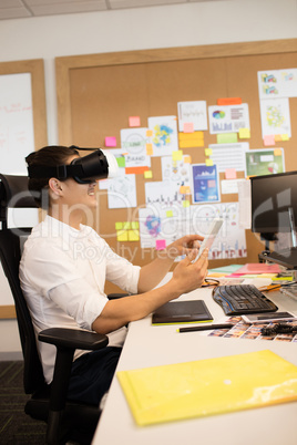 Businessman wearing vr glasses in office
