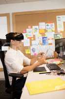 Businessman wearing vr glasses in office