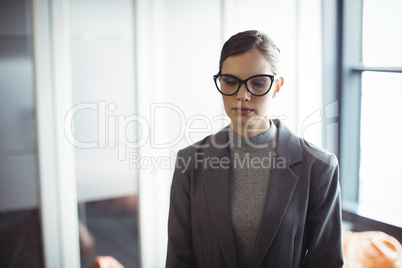 Counselor in glasses standing