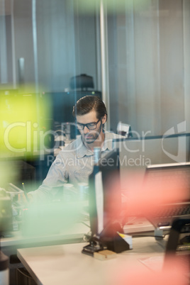 Concentrated businessman working at office