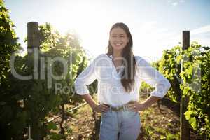 Portrait of smiling woman at vineyard