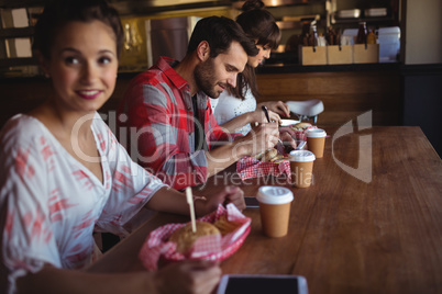 Friends having burger together