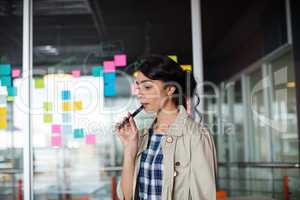 Female executive smoking electronic cigarette