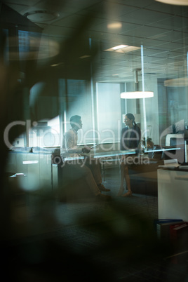 Business people interacting with each other during meeting at office