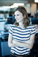 Thoughtful businesswoman looking away at office