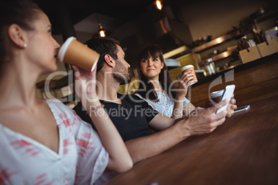 Friends having coffee at restaurant