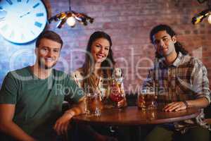 Portrait of young friends having cocktail drink