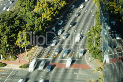 Blurred motion of cars moving on road