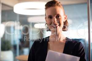 Portrait of smiling businesswoman at office