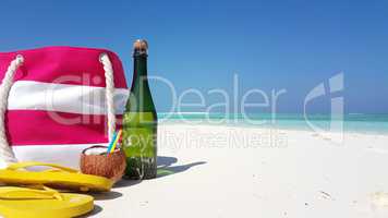 v02057 Maldives beautiful beach background white sandy tropical paradise island with blue sky sea water ocean 4k champagne bag coconut