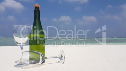 v02081 Maldives beautiful beach background white sandy tropical paradise island with blue sky sea water ocean 4k champagne glass bottle