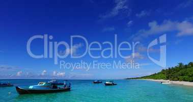 v02264 Maldives beautiful beach background white sandy tropical paradise island with blue sky sea water ocean 4k boats