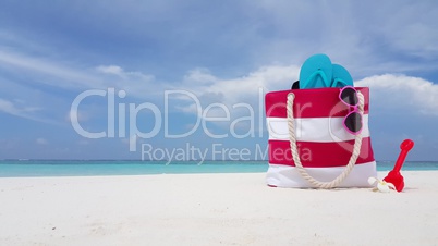 v02355 Maldives beautiful beach background white sandy tropical paradise island with blue sky sea water ocean 4k bag flip flops