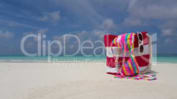 v02393 Maldives beautiful beach background white sandy tropical paradise island with blue sky sea water ocean 4k bag bikini sunglasses