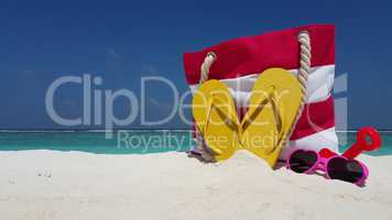 v02461 Maldives beautiful beach background white sandy tropical paradise island with blue sky sea water ocean 4k bag flip flops sunglasses