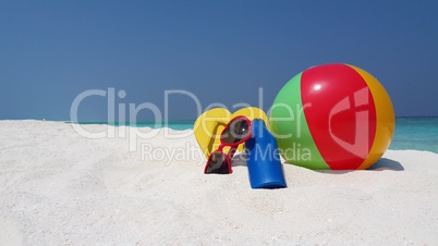 v02899 Maldives beautiful beach background white sandy tropical paradise island with blue sky sea water ocean 4k ball sun cream