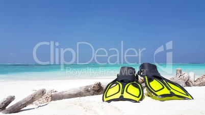 v02917 Maldives beautiful beach background white sandy tropical paradise island with blue sky sea water ocean 4k yellow scuba snorkel fins flippers