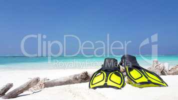 v02917 Maldives beautiful beach background white sandy tropical paradise island with blue sky sea water ocean 4k yellow scuba snorkel fins flippers