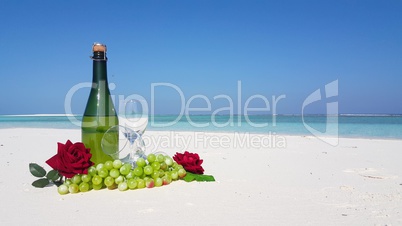 v02923 Maldives beautiful beach background white sandy tropical paradise island with blue sky sea water ocean 4k champagne bottle glass grapes