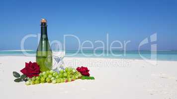v02923 Maldives beautiful beach background white sandy tropical paradise island with blue sky sea water ocean 4k champagne bottle glass grapes