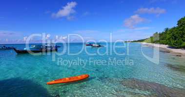 v02926 Maldives beautiful beach background white sandy tropical paradise island with blue sky sea water ocean 4k boats