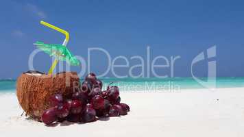 v02949 Maldives beautiful beach background white sandy tropical paradise island with blue sky sea water ocean 4k coconut red grapes