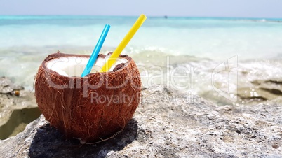 v02951 Maldives beautiful beach background white sandy tropical paradise island with blue sky sea water ocean 4k coconut drink milk
