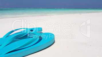 v02971 Maldives beautiful beach background white sandy tropical paradise island with blue sky sea water ocean 4k flip flops