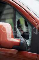 forced car windscreen and broken